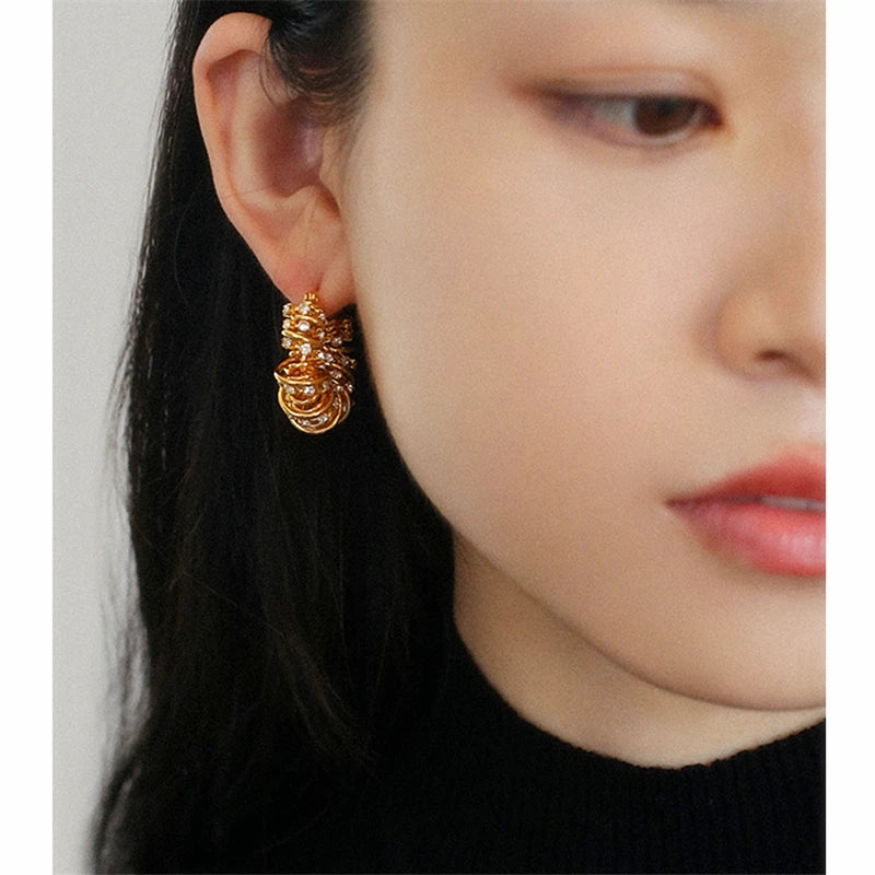 HUANQI Fashion Multi-layer Twist Rhinestone Metal Ear Buckle for Women Gold Color Personality Charm Earring Jewelry